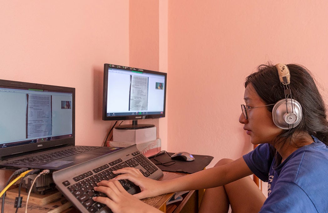 Student attending an online class in Nepal