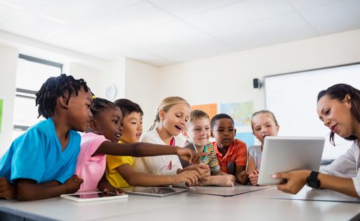 Students use tablets in the classroom